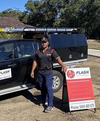 Photo of flash window cleaning and property services franchisee immaculately cleaning windows and cleaning the home of a property in the Campbelltown Region