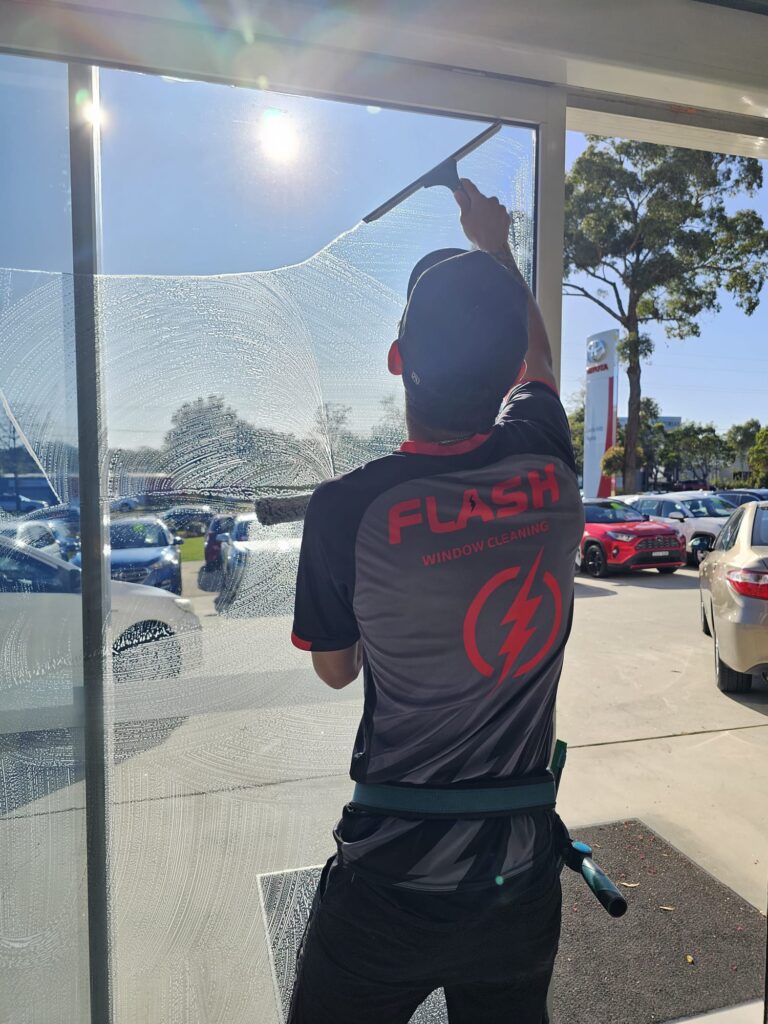 Photo of flash window cleaning and property services franchisee immaculately cleaning windows and cleaning the home of a property in North Sydney and North shore
