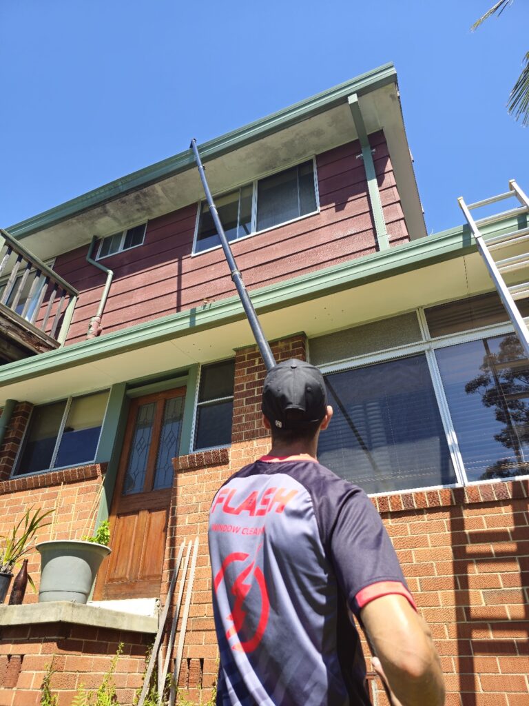 Photo of flash window cleaning and property services franchisee immaculately cleaning windows and cleaning the home of a property in the Northern Beaches Region of NSW